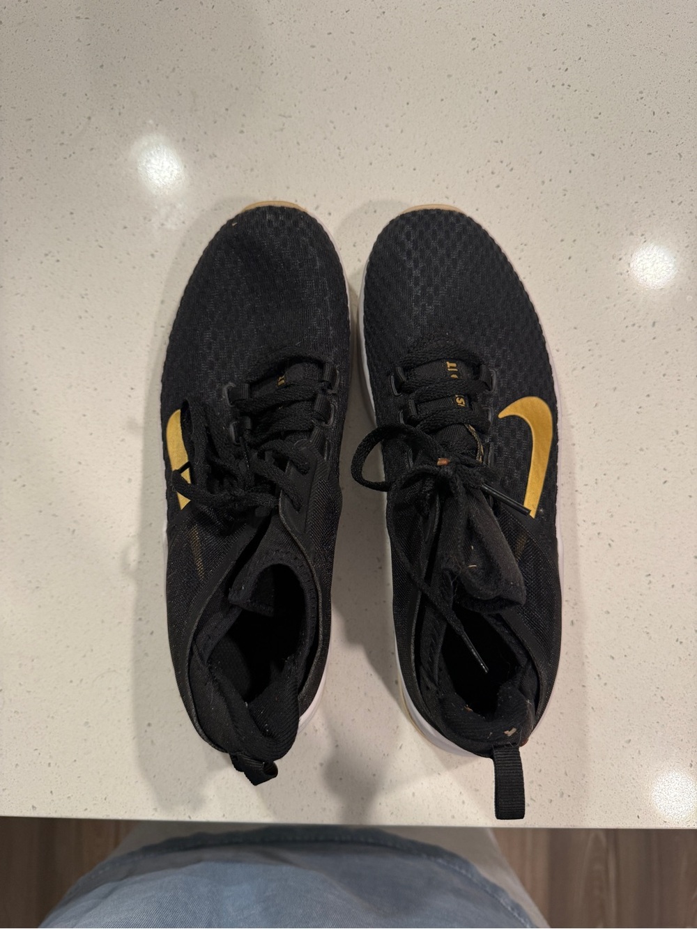 Nike women’s Black and Gold Running Shoes